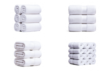 Neatly rolled white towels for spa and bathroom decor