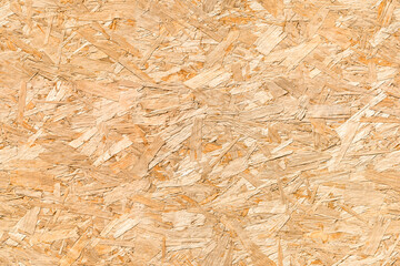 OSB Oriented strand board seamless background texture – pattern of flat fibreboard building panel from wooden chip material used in DIY, domestic and commercial construction.