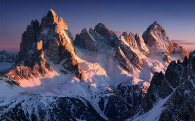 Dramatic Snowy Mountains at Sunrise or Sunset