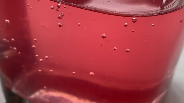 pill and glass of water. slow motion video. High quality footage 4k