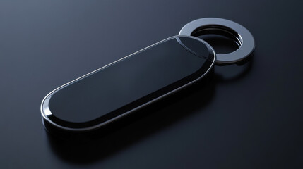 Minimalist car key fob on sleek black surface, luxury automotive branding style.