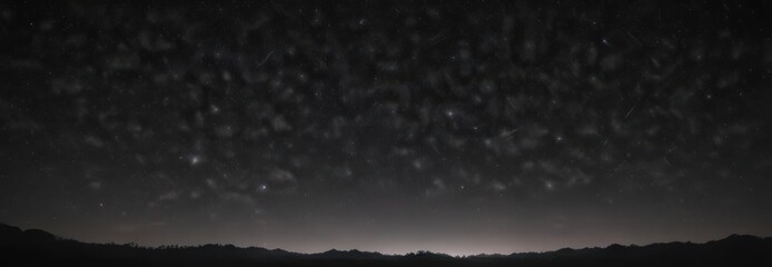 Countless stars glimmer in an immense, velvet black sky ,  infinite,  light years