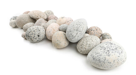 Sea washed oval pebbles isolated on white background. Arrangement of smooth round stones.