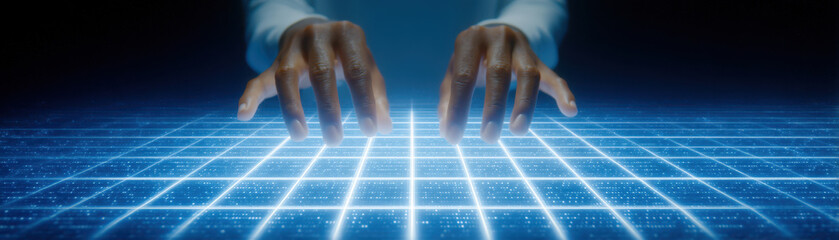 Closeup of hands interacting with digital grid, symbolizing technology and innovation. glowing grid represents data