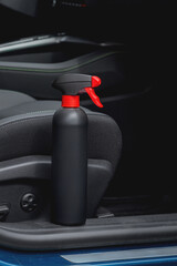 Naklejka premium Car interior with cleaning supplies and microfiber cloth