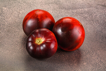 Black ripe juicy organic tomato