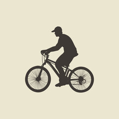 Obraz premium Silhouette of a person riding a bicycle, representing outdoor activity and recreation