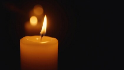 Close-up of a flickering candle flame, warm yellow light against a dark background , candle, soft, element