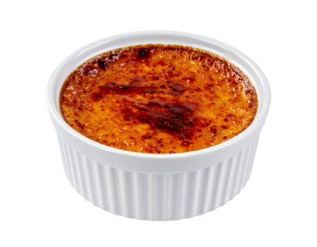 Creme brulee in white ceramic ramekin on transparent background