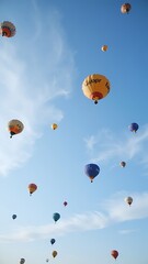 Obraz premium Colorful Balloons Ascending, Clear Blue Sky