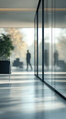 Interior of modern office building with person walking in a blurred background