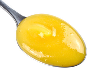 Spoon holding lemon curd isolated on transparent background