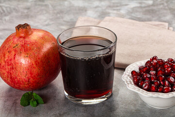 Sweet fresh pomegranate juice with fruit