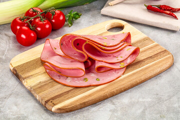 Mortadella pork sausages slices heap