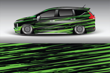 Sleek modified car with vibrant green graphics on display