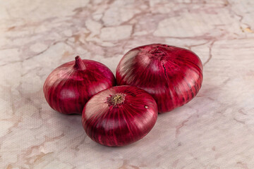 Raw ripe purple onion bulb