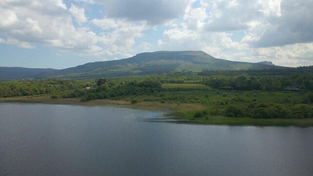 Picturesque typical Irish scene with blue lake and mountain background. Lough Melvin, Leitrim, Ireland