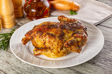 Baked in oven whole chicken with spices