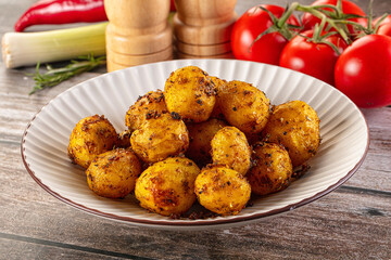 Baked small baby potato with herbs