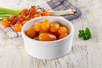 Marinated yellow cherry tomatoes heap