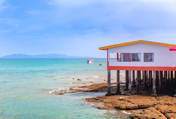 View of fisherman's houses on the island and tourist accommodation on Koh Chang, Thailand
