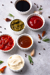 Set of different sauces. Ketchup, mustard, pesto