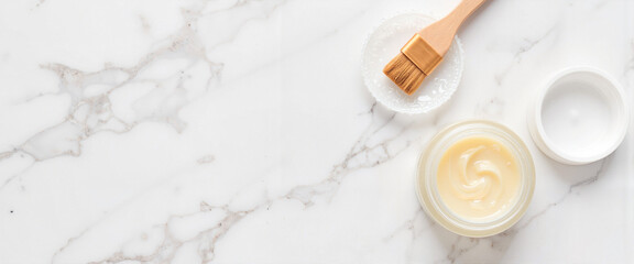 Transparent gel mask with brush on elegant marble table, clean beauty concept