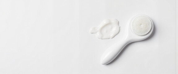 Minimalistic silicone cleansing brush with foam, sleek skincare tech