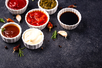 Set of different sauces. Ketchup, mustard, pesto