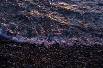 The ocean is calm and the water is dark blue