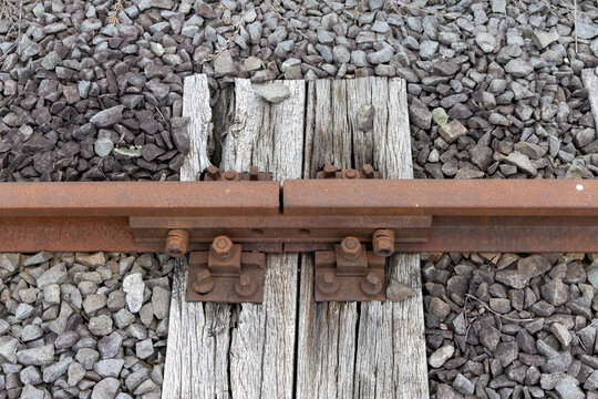 Railway Track Fish Plate Rusted. Rails joint of an old, rusty railway track