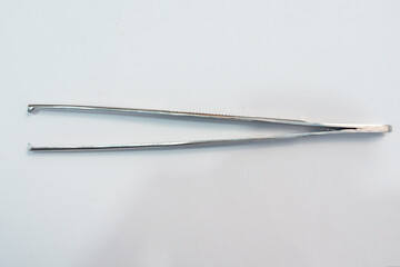Dissecting Forceps Isolated on white background. Medical instrument