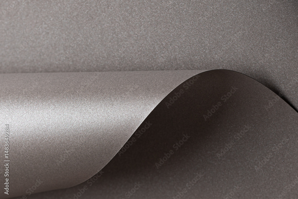 Poster Gray glossy paper texture with a pearlescent finish, featuring wavy folds and edges. Elegant, sleek