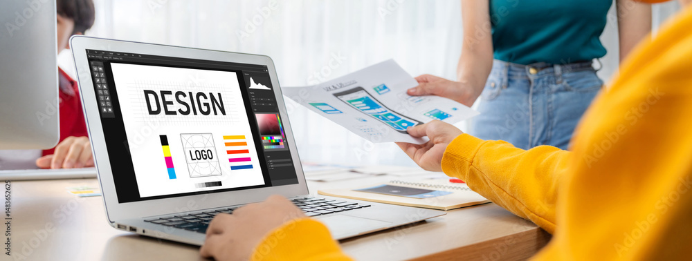 Fototapete graphic designer software for modern design of web page and commercial brisk ads showing on the comp
