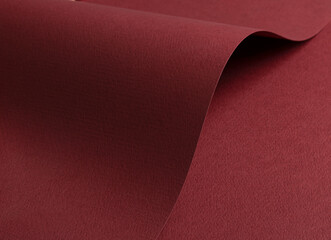 Dark burgundy matte paper texture with a rich, premium finish, featuring wavy folds and edges.