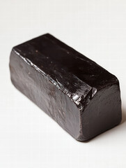 Dark Chocolate Delights: A close-up shot reveals a decadent bar of dark chocolate. The texture and rich color promise a sensory experience for the connoisseur.