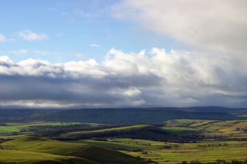 Green hills under sunlight