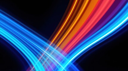 Dynamic Light Trails: An abstract design composed of vibrant, swirling light trails in hues of blue, orange and red against a stark black background. Capturing a sense of speed, energy.