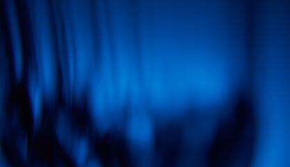 Abstract light leaks on black background with copy space. Studio lens flare bokeh effect.