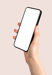 Fototapeta na wymiar Woman holding smartphone, displaying a blank screen. Using mobile device for communication, browsing