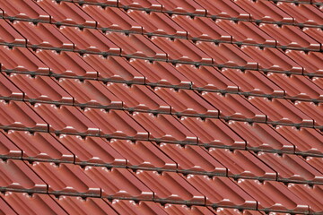 Red tiled roof textured abstract background, Red ceramic tiles roof background. sstkBackgrounds