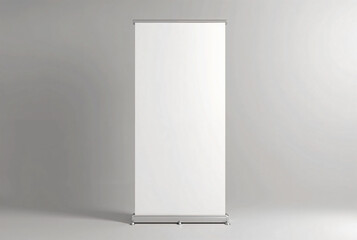Blank White Roll-Up Banner Stand Displayed Against a Plain Gray Background
