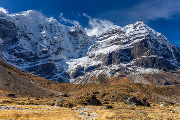 Mera Peak high altitude mountain summit ascent in Himalayas. Stunning views above the clouds at sunrise from the top of the mountain. Alpine route climbing on the snow path in Himalayas