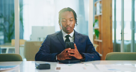 Phone, business and serious black man in office to check email, message or investment banking....