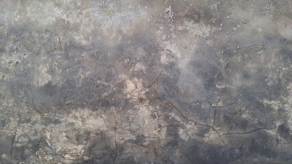 Grunge concrete texture with distressed weathered stone surface, aged wall background with rough...