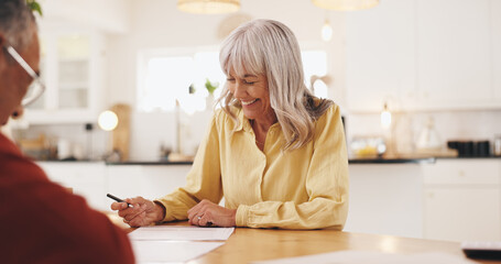 Old man, financial advisor and writing on paperwork in home for insurance application, pension fund and contract. Happy, woman and elderly patient with documents for mortgage loan or asset management