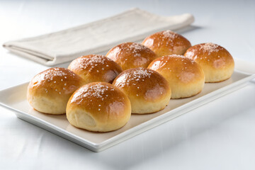 Fresh Baked Bread Rolls on White Plate