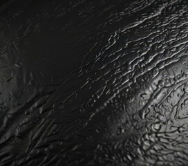 Fototapeta premium Deep black leather, intricate grain, glossy sheen , backdrop, black background