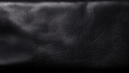 a dark black textured surface with a slightly uneven distressed look the texture resembles weathered leather or worn out fabric