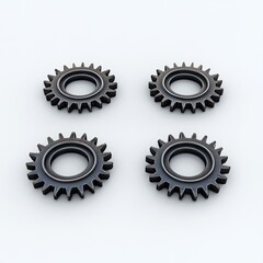 Four metal gears arranged in a grid pattern